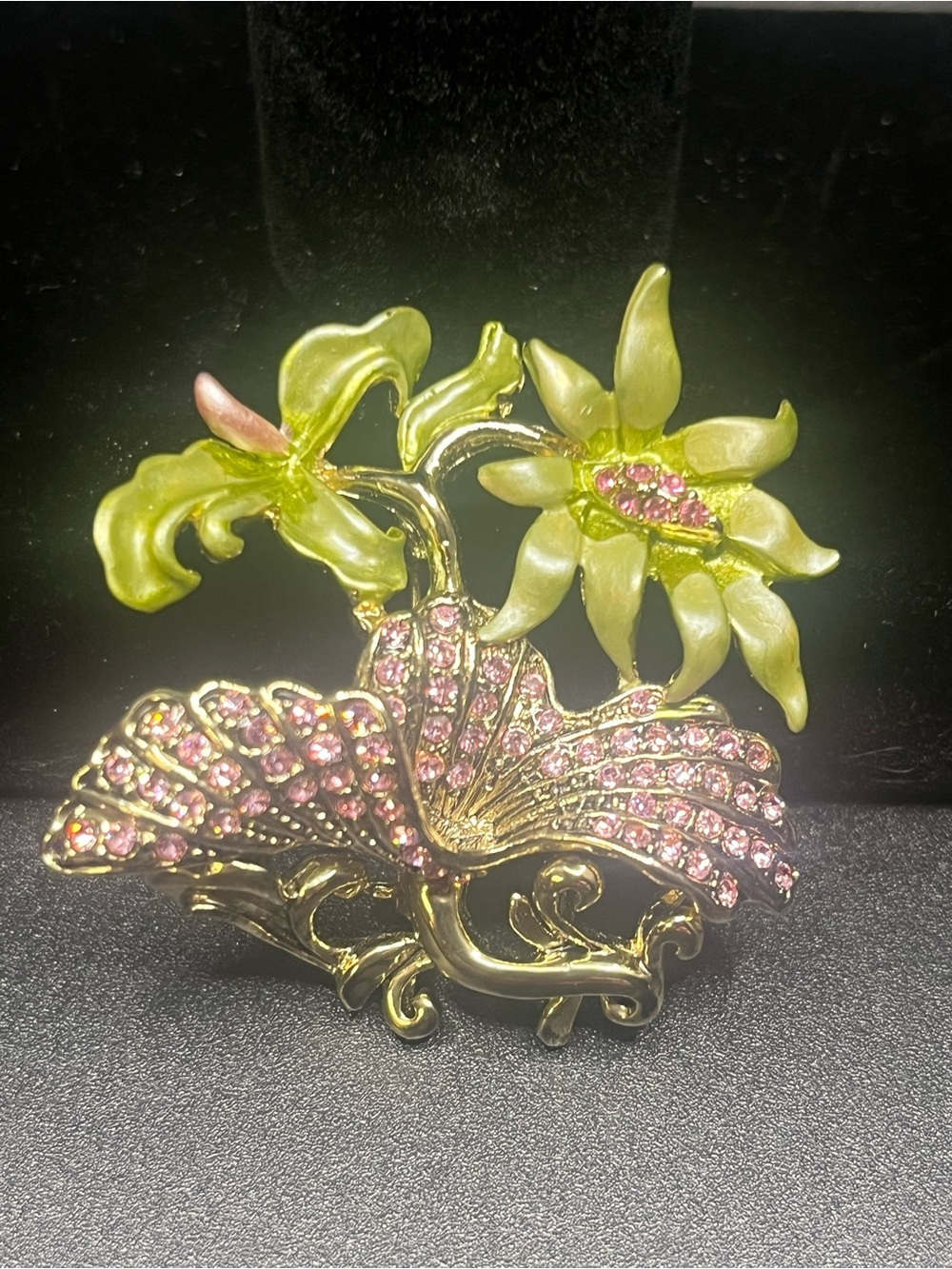 Pretty statement butterfly brooch featuring glossy black and creamy ivory enamel